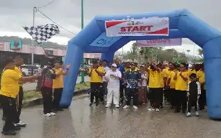 Dandim Fakfak Bersama Jajaran Ramaikan Jalan Santai Sambut HUT Bhayangkara ke-80